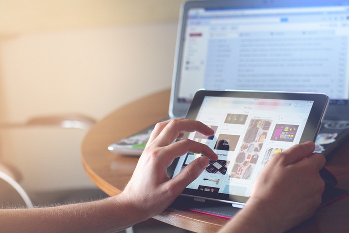 a person researching products on various devices